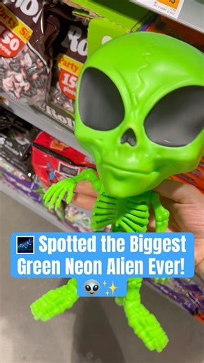 UFO Vibes: Giant Neon Alien Lights Up the Night 👾💚