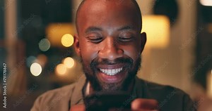 Black man, face and chat on smartphone at night for communication, email or texting at home. Happy, funny meme and social media with post online, mobile app and connectivity while at apartment