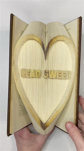 Embossing my logo into book folding art #bookart #bookfolding #booktube