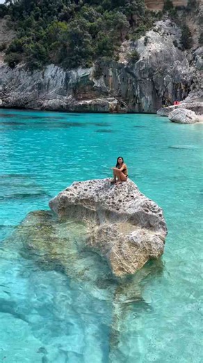 Turquoise Waters and Rocky Coastline at a Scenic Beach