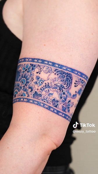 Unique Blue Tiger Tattoo Inspiration for Band Tattoos