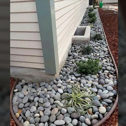 Modern pebbestone landscaping ideas