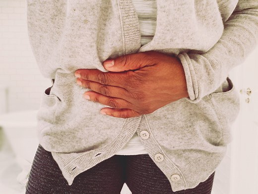 Why Experts Say Nausea and Throwing Up May Be Unpredictable Signs of Omicron COVID-19 Infections