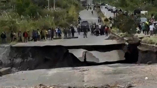 Road Crumbles In Slow Motion In Indonesia Flood Disaster