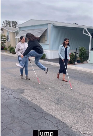 What not to do when you see a person with a cane. Video description for our visually impaired friends: video shows three scenes - the first is two girls with canes walking down the street and a woman walking from the opposite side and runs into one of the girls rather than moving over. The second shows the girls walking with canes and a third girl coming from the opposite direction and jumping over one of the canes. And the third is a girl walking by the two girls with canes and staring profusel