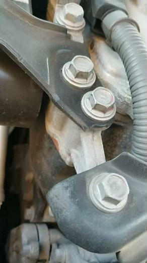 2012 Toyota Camry rattling noise from the right side of the engine.