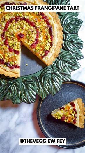 Christmas Frangipane Tart - an easy, vegan and gluten-free recipe that is low-GI! Here’s to nourishing Christmas with mindful eating! For The Tart @TheVeggieWifey Ingredients: 1.5 cups almond flour 1/4 cup maple syrup 3 tbsp EV coconut oil A pinch of salt To Make: 1. Whisk all the ingredients together, and shape into your tart mould 2. Bake for 10 minutes at 175°C For The Frangipane @TheVeggieWifey 1.5 cups blanched almonds 1/2 cup maple syrup 1/4 cup EV coconut oil 1/4 cup non-GMO soy milk 1 ts