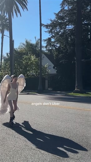 Angels don’t Uber. They roller skate. Duh!!! I made these angel wings FYI and they’re available for rent for your next photo shoot🪽🩷