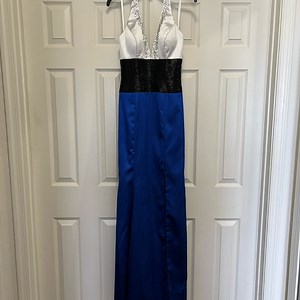 Cute prom dress from “Wow! Prom & Pageant, White/Black/Royal, Size 6”.
