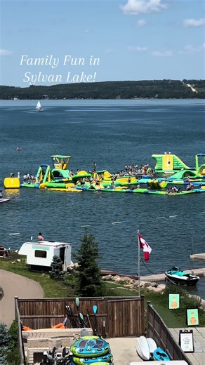 Coolest Attraction in Sylvan Lake! TAG YOUR SUMMER FUN BUDDY & GO! 💦☀️🇨🇦 #SylvanLake #SylvanLakeAquaSplash #GetOutside #TravelTikTok #FamilyFun #Alberta #fypシ゚