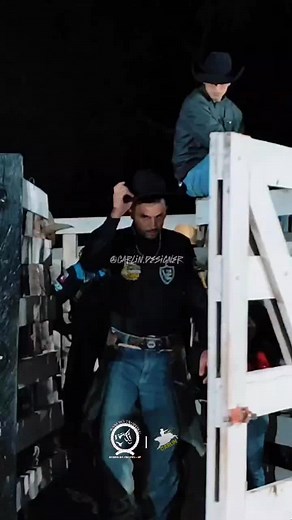 Exciting Rodeo Bull Riding Action at Night