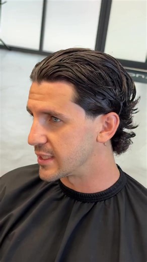 Curls, cut your way. 💈 Men’s grooming is embracing natural texture in a whole new way — think tapered sides with longer, curly length in the back. It’s giving mullet energy, but elevated: modern, stylish, and designed to let curls (or waves) take center stage. Texture isn’t just a detail, it’s the statement. Are your clients ready to wear it with confidence? Hair by @cutsbyalfie | America's Beauty Show by Cosmetologists Chicago