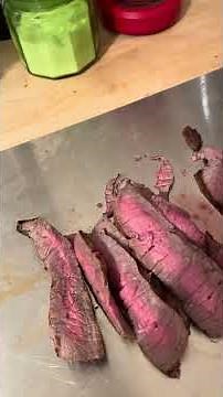 Slicing and serving grilled London broil.