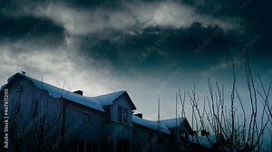 Dark Clouds in the sky over Horror Scary Haunted House. Halloween.
