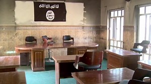 Captured ISIS courtroom as human cages
