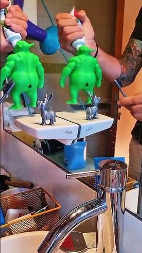 He created a Shrek-themed toothpaste holder!