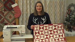 Use red and white scraps in a table mat that looks stylish and protects your table from hot dishes! Get the table mat pattern here: www.allpeoplequilt.com/quilt-patterns/table-runners/scrap-lab-table-mat | American Patchwork & Quilting