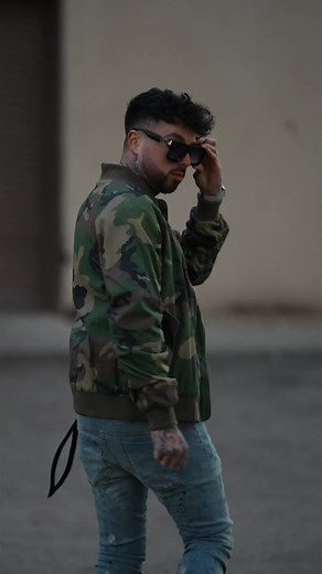 Stylish Camo Outfit for Men: Camo Jacket and Yellow Boots