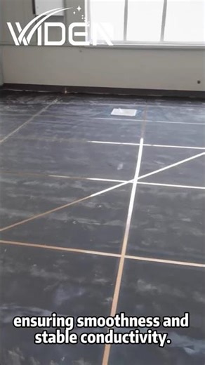 Applying the final topcoat on an ESD epoxy floor.