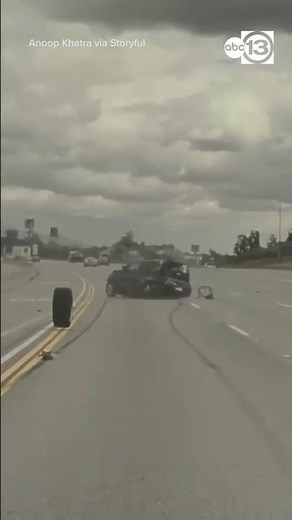 A car was sent flying through the air after being struck by a tire