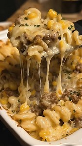 Garlic Beef & Corn Rotini Pasta Bake Packed with savory garlic-seasoned beef, sweet corn, and cheesy goodness, this easy rotini pasta bake is a weeknight winner and festive enough to earn a spot on your cozy Christmas menu. Ingredients: 1 lb (450g) ground beef 12 oz (340g) rotini pasta 1 tbsp olive oil 4 cloves garlic, minced 1 cup frozen corn (thawed) 1 can (15 oz) tomato sauce 1 tsp Italian seasoning ½ tsp paprika ½ tsp salt ½ tsp black pepper 1 ½ cups shredded mozzarella cheese ½ cup grated P