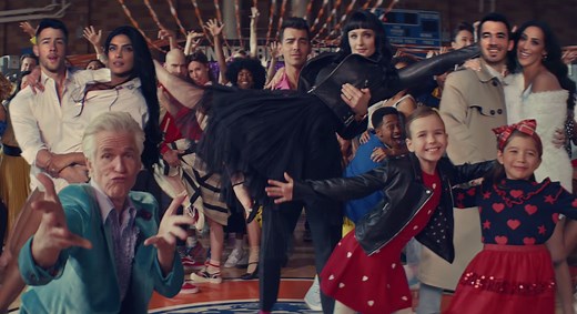 Jonas Brothers Pay Homage to 'Risky Business,' 'Grease,' 'Say Anything' in 'What a Man Gotta Do' Video