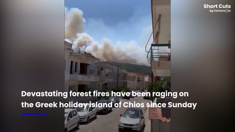 Greek holiday island partially evacuated as devastating forest fire rages