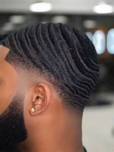 A clean 360° waves haircut with a sharp fade and crisp lineup. This cut shows how proper brushing, wolfing, and a skilled barber bring out deep spinning waves. Perfect for men who want elite wave definition and a polished barbershop finish. #360waves #wavecheck #wavesonspin #menshaircut #barbershop