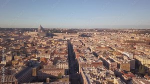 Aerial Cinematic drone downtown Piazza Rome Italy birds flying past buildings and streets of Vatican City St Peters Europe Sistine Chapel square morning upward movement