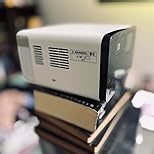 Epson EpiqVision Mini EF21 Portable Smart Laser Projector, Bright 1,000 Lumens, FHD 1080p HDR, 3-Chip 3LCD, Google TV, Netflix, Stereo Speakers, Family Party/Outdoor Backyard/Home Theater - White