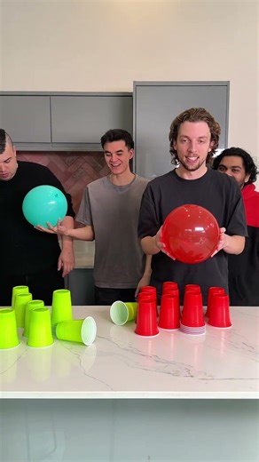 First to Stack their Cups Wins!