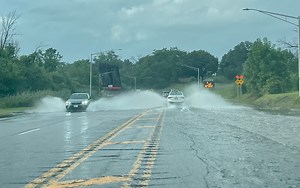 Heavy rains slam Central NY, flooding home basements, closing parts of I-690