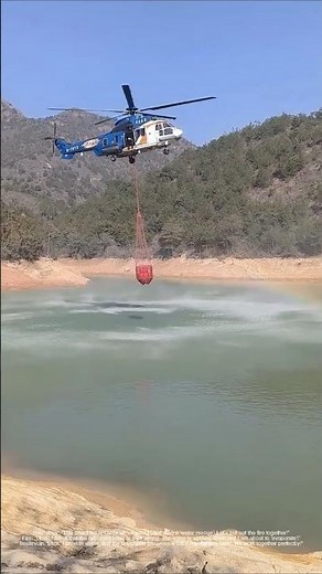 Helicopter firefighting: the process of taking water from the air and extinguishing forest fires