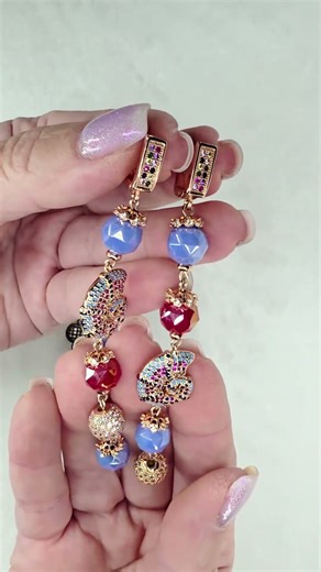 Colorful ocean-inspired spiral earrings in gunmetal and rose gold