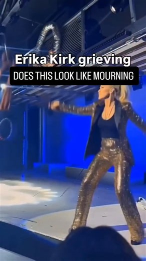 Joe Alazan on Instagram: "🧐 Does this look like grieving? Viral clips of Erika Kirk onstage — dancing with fireworks, moving energetically and visibly confident — are sparking huge online debate about how public grief looks. Since the assassination of her husband Charlie Kirk in September, Erika has appeared at multiple events, taken leadership of Turning Point USA, and remained highly visible — leading to memes and conversations about public mourning and expectations. � There’s no official “an