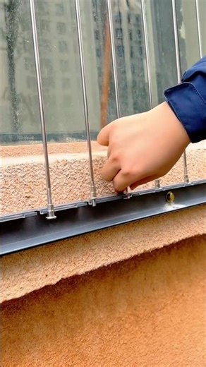 Installing and Tightening Iron Window Bars Securely Along the Concrete Frame #shorts