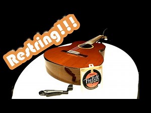 How to restring a classical guitar.