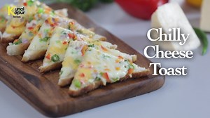 Chilly Cheese Toast - Melting cheese on a crisp toast, now who can resist that. Here's an incredibly simple recipe of Chilly Cheese Toast that can be done on a pan. #KKitchen #KunalKapurRecipes #ChillyCheeseToast | Kunal Kapur