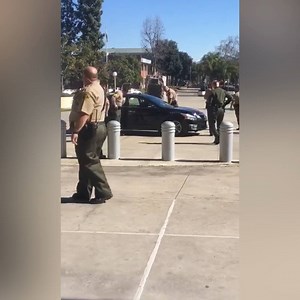 Fresno County Sheriff's deputies detained a man after he drove his car up the courthouse barries in Downtown Fresno this morning. There were several messages spray-painted onto the man's car including 'unarmed.' https://abc30.com/5183957/ | ABC30 Action News