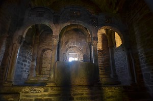 The altar with its columns and light that enters through its small...