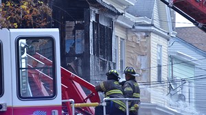Woman charged over fire that destroyed vacant Paterson home inhabited by squatters