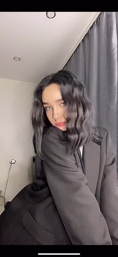 Dynamic Dance Moves in a Stylish Living Room