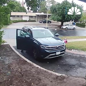 Harrowing footage shows a coyote attack a child and father in the driveway of a home in broad daylight in Southern California. | NBC Chicago
