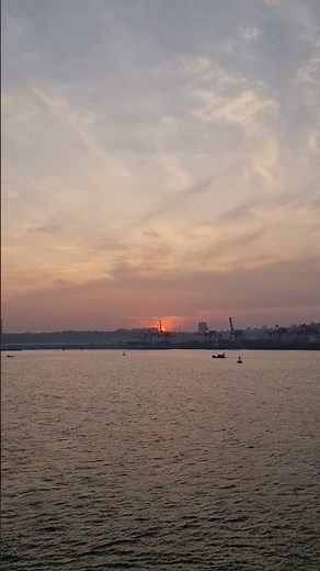 Sunset at the Port – Calm Sea & Golden Sky