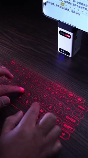 A laser projection keyboard that instantly transforms your phone and tablet into a computer!