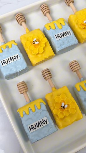 Rice Krispie treats for a Winnie-the-Pooh baby shower 🍯🐝🩵 • place in the freezer 10-15 minutes before dipping #babyshower #babyshowerideas #winniethepooh #winniethepoohbabyshower #fblifestylere | Berry Nice Berries