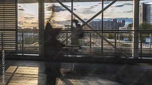 Movement of people on the modern covered pedestrian bridge ,time lapse