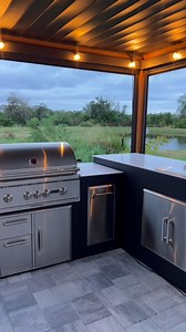 The ultimate entertaining backyard is HERE! 🍔🍹 Picture this: a modern stone outdoor kitchen with a sleek bar island, state-of-the-art appliances, and a vent hood for safe, top-tier cooking. 🔥💨 Add in comfy lounges 🛋️, TVs 📺, and even a cornhole setup 🎯—this space is a blueprint for outdoor entertaining done right. Crafted with quality & durable materials, this outdoor kitchen is built to handle every party, BBQ, and game day celebration for years to come. 🛠️🏡 Ready to create your dream 