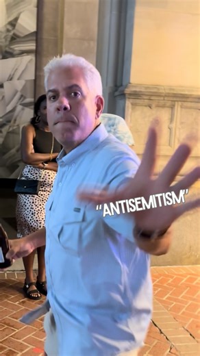 During a March for Palestine on 10/4/25 in New Orleans a vile zio shows what real antisemitism looks like. I didn’t have to say or do anything for him to grab my phone, unsuccessfully. He then proceeded to throw beer in my face. | Heather Ann