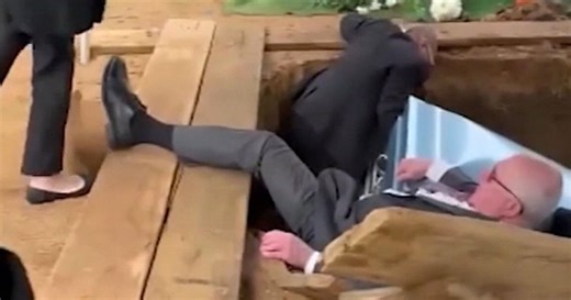 Pallbearers fall into grave while carrying the casket after platform collapses